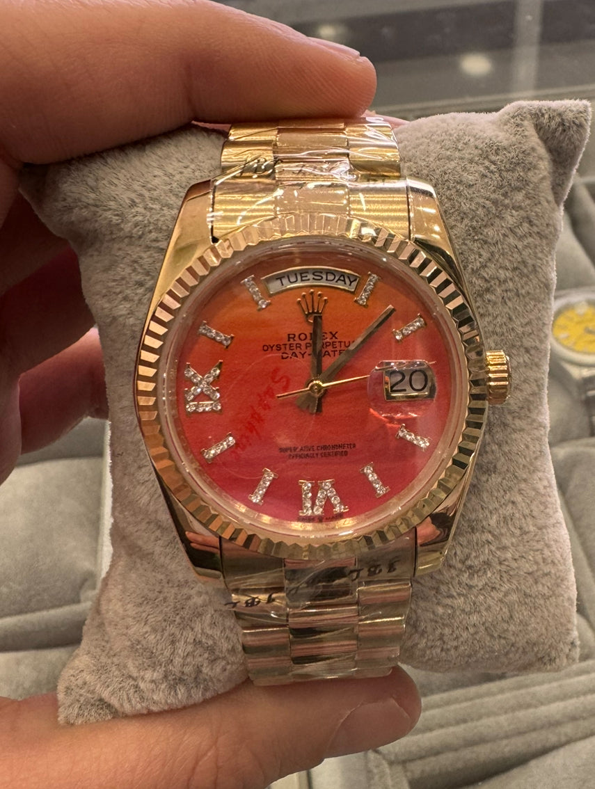 Rolex Day-Date 36 Yellow Gold Carnelian Orange Diamond Roman VI IX Dial & Fluted Bezel President Bracelet