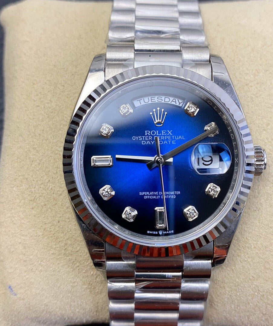 Rolex Day-Date 36 President White Gold Blue Baguette Dial