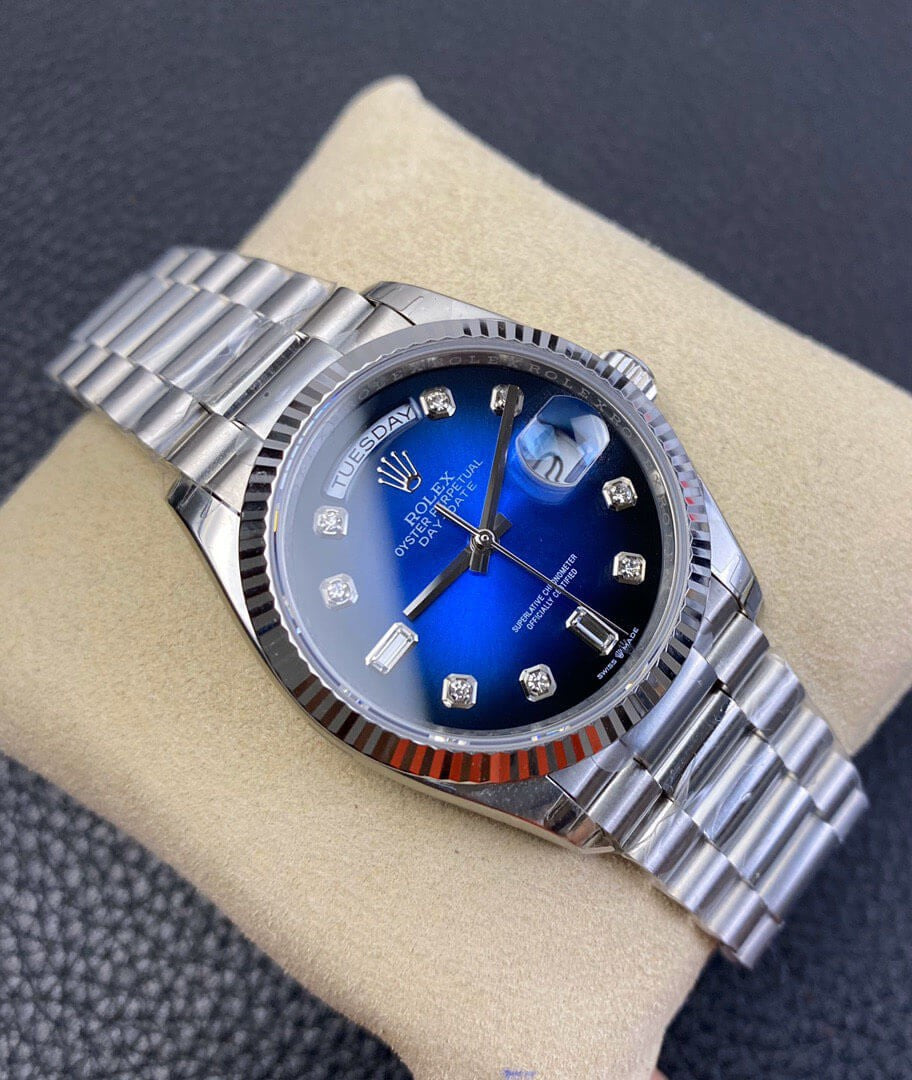 Rolex Day-Date 36 President White Gold Blue Baguette Dial