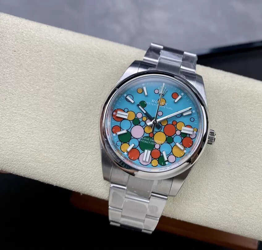 Rolex Oyster Perpetual 41mm Turquoise Celebration Motif Dial