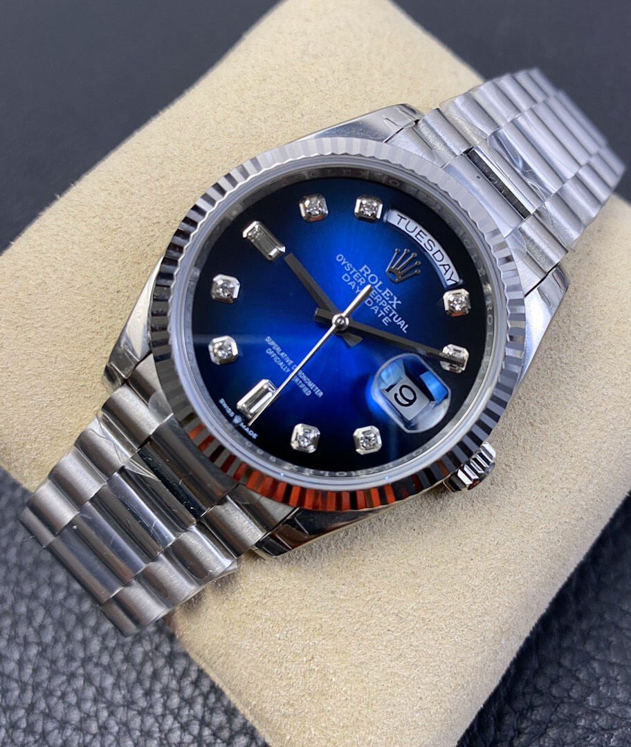 Rolex Day-Date 36 President White Gold Blue Baguette Dial