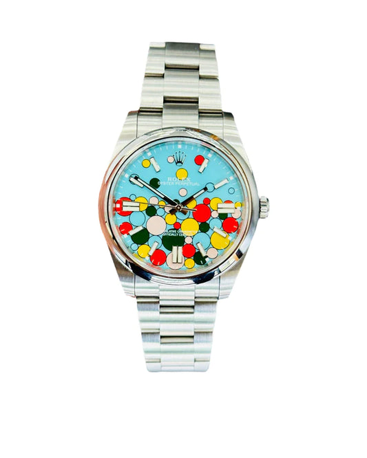 Rolex Oyster Perpetual 41mm Turquoise Celebration Motif Dial